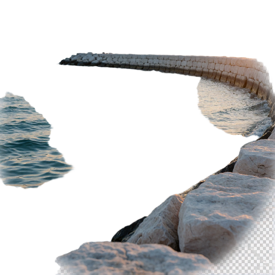 Calm Lake Michigan shoreline at sunrise with a pale stone breakwater and distant skyline